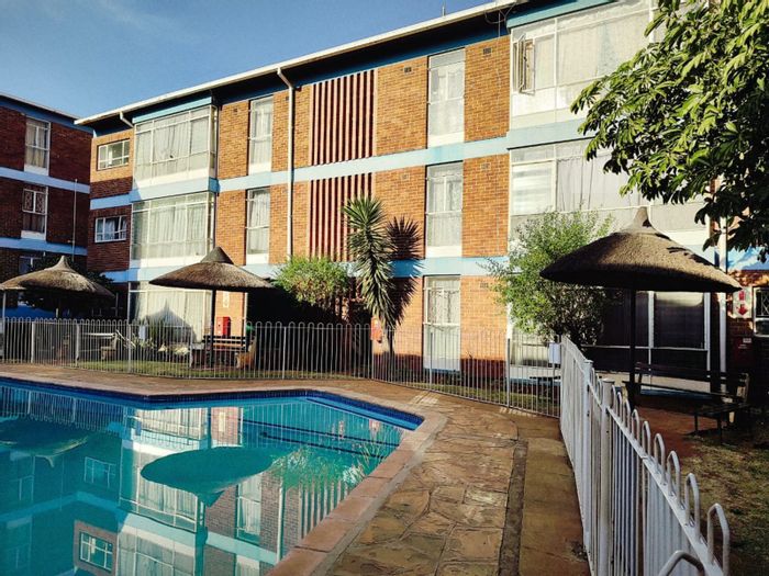 2-bedroom apartment with open plan lounge, kitchen, and garage in Kempton Park AH For Sale.