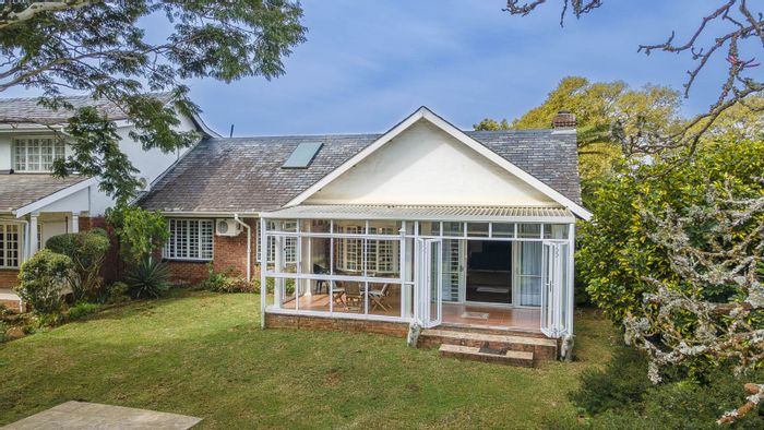 For Sale: Hillcrest Park Townhouse with 2 Beds, 2 Baths, Double Garage, Pet-Friendly.