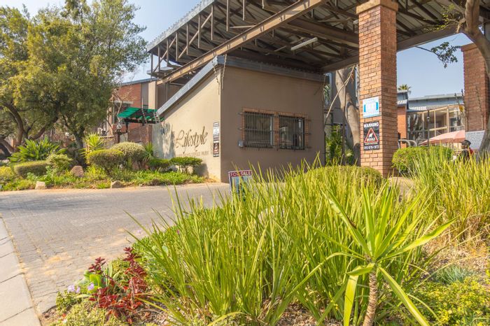 Office For Sale in Randpark Ridge: Riverfront views, boardroom, secure access, ample parking.
