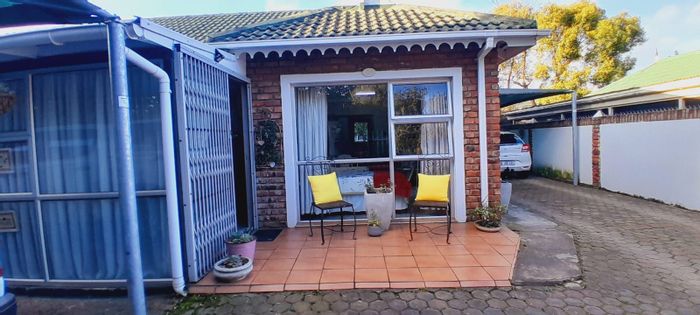 For Sale: House in George South with guest suite, garage, and ample parking.