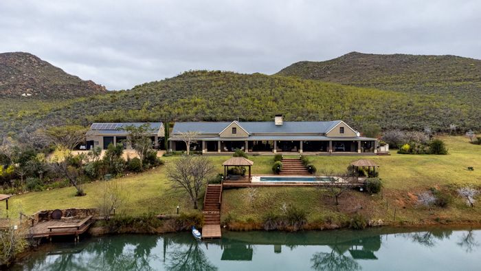 For Sale: Farm in Oudtshoorn Rural with private dam, luxury amenities, and wildlife.
