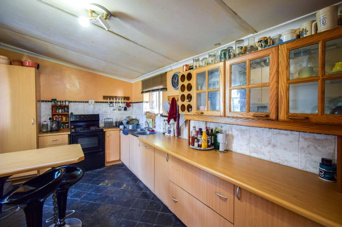 For Sale: Waterkloof Ridge house with 7 bedrooms, pool, and development potential.