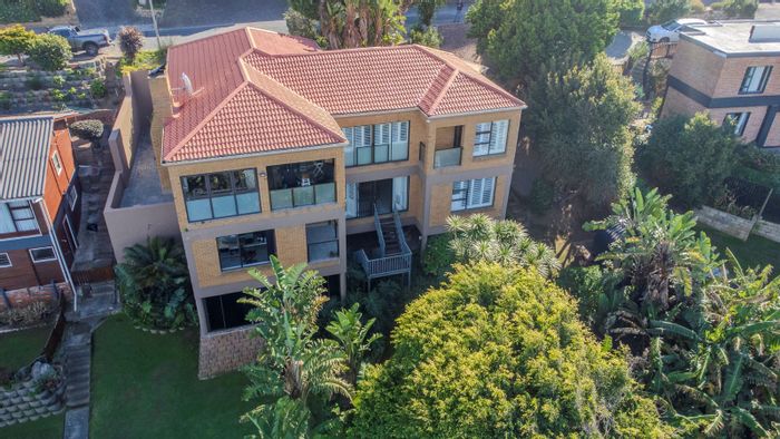 House for Sale in Outeniqua Strand: Ocean views, indoor pool, self-contained flatlet.