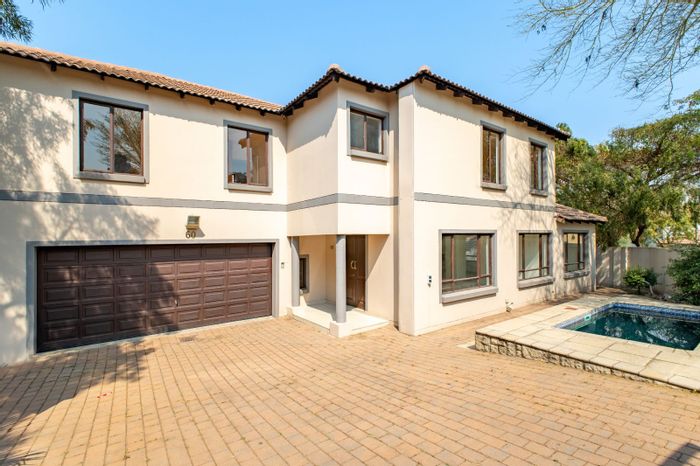 For Sale: 4-Bedroom House in Craigavon with Pool, Double Garage, and Bar Area.