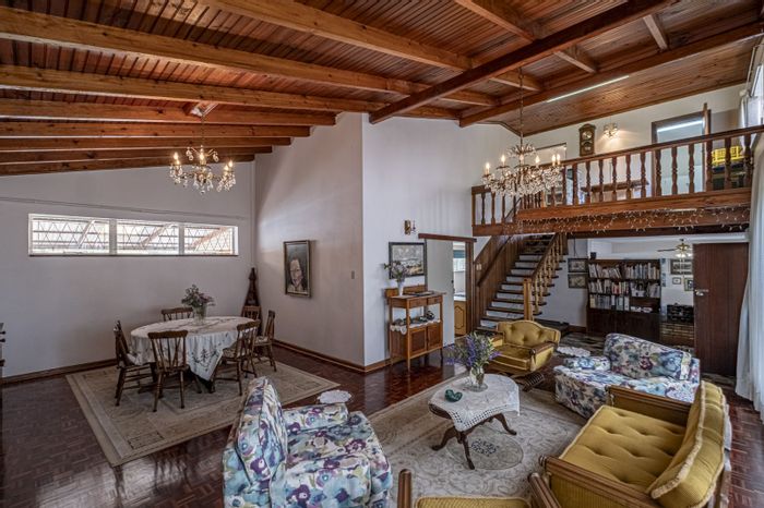 House for Sale in Janssendal: 4 bedrooms, spacious garden, versatile workspace, and braai area.