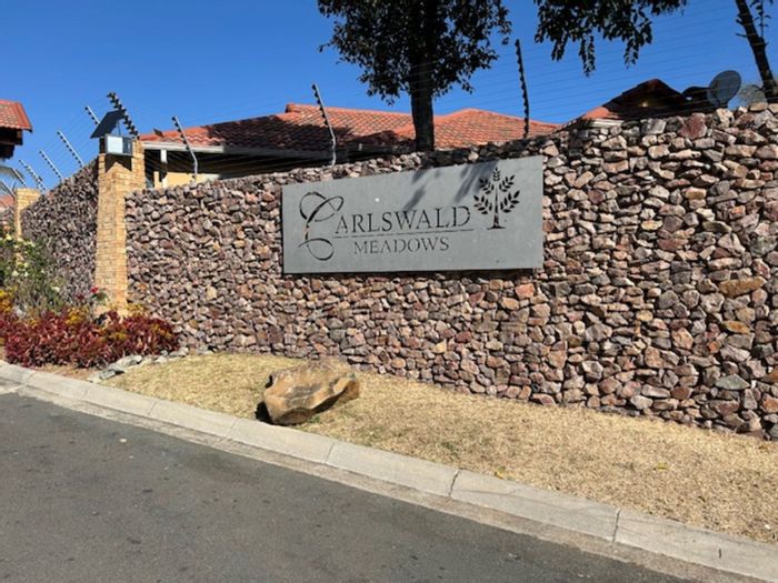 For Sale: 3-Bedroom Townhouse in Carlswald with Pool, Clubhouse, and Security Features.