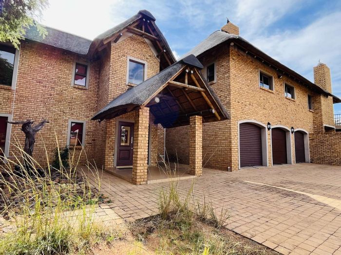 For Sale: House at Zebula Golf Estate with 5 bedrooms, pool, and golf access.