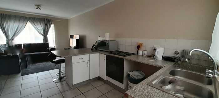 For Sale: Kenmare Apartment with 2 Bedrooms, Parking, and Secure Living.