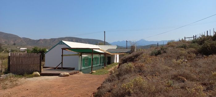 Calitzdorp Rural House For Sale: Restored cottage, scenic views, outdoor entertaining spaces.