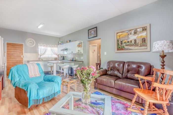 2-Bedroom Apartment For Sale in Weltevreden Park with Pool, Security, and Gardens.