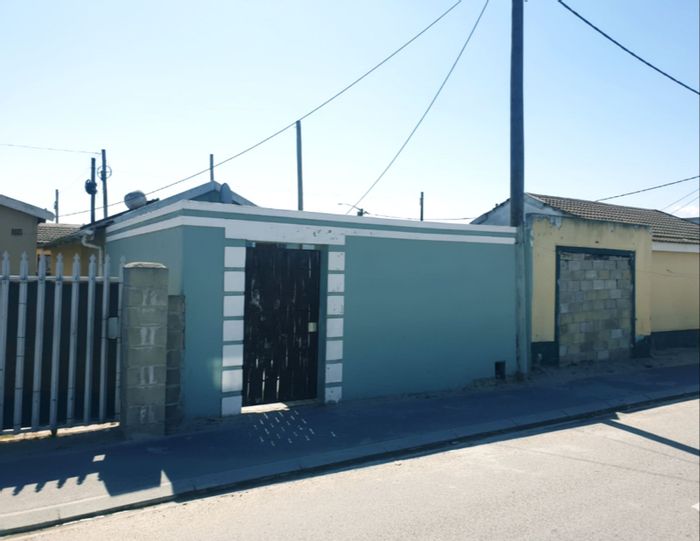 2-Bedroom House For Sale in Mfuleni with yard, fibre internet, and rental potential.