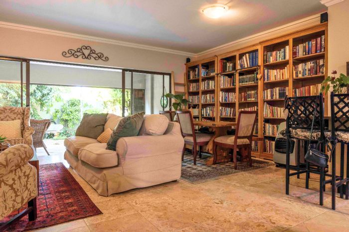 For Sale: Fairland Townhouse with garden, fireplace, pool, and spacious living areas.