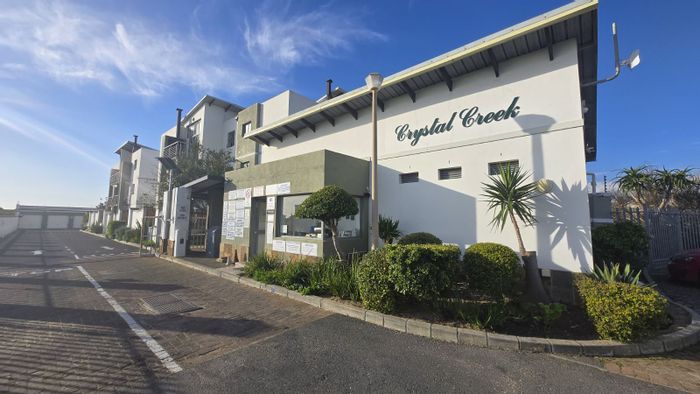 2-Bedroom Apartment For Sale in Whispering Pines with 24-hour security and balcony.