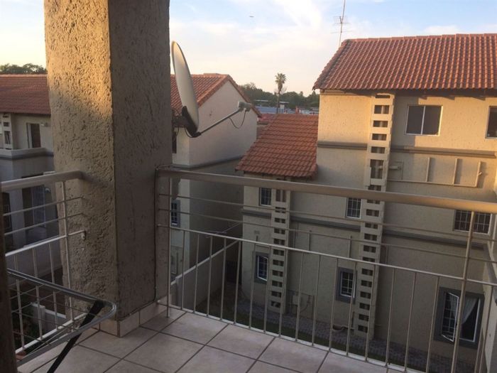 Noordhang Apartment For Sale: Top-floor unit with pool, security, and patio.