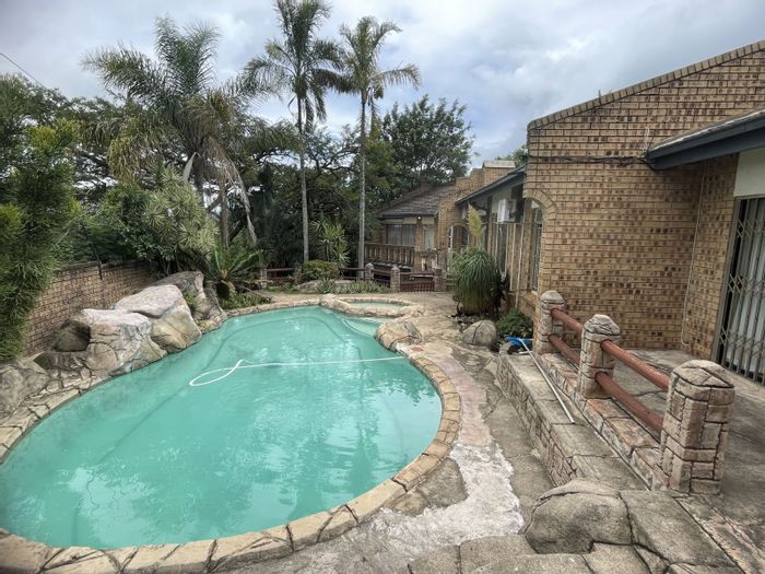 For Sale: House in Nelspruit Ext 11 with pool, patio, and three garages.