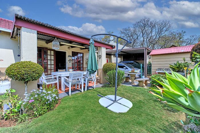 For Sale: 2-Bedroom Townhouse in Little Falls with garden, pool, and secure parking.