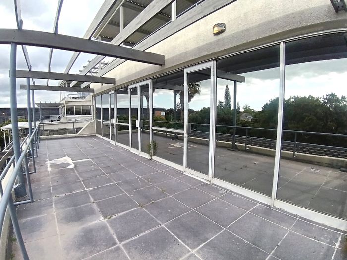 Spacious 436 m2 office in Pinelands with private veranda and secure parking. To Rent.