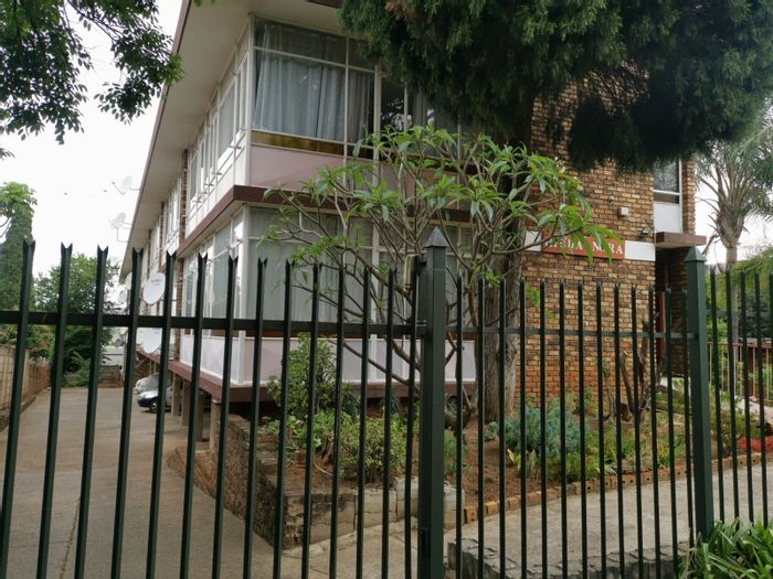 1-Bedroom Apartment For Sale in Mountain View with communal braai area and parking.