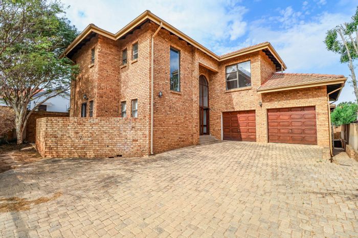 For Sale: Spacious 5-bedroom house in Amberfield with double garage and patio.