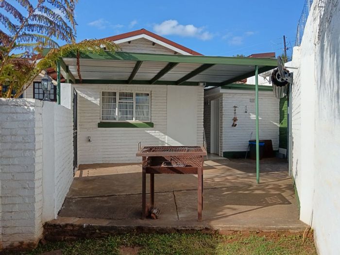 House for Sale in Sabie Central: 2 beds, communal pool, braai area, investment potential.