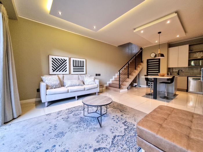 For Sale: Townhouse in Hazelwood with private patio, secure parking, and top security.