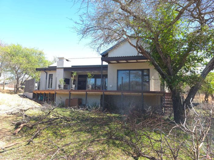 House for Sale in Hoedspruit Central: 3 beds, pool, greenbelt views, ideal location.