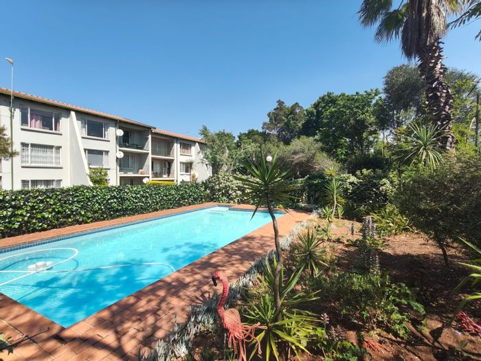 Kensington B Apartment For Sale: 2 beds, pool, garage, private balcony.