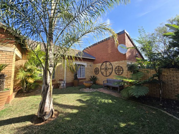 For Sale: Townhouse in Equestria with garden, double garage, and estate amenities.