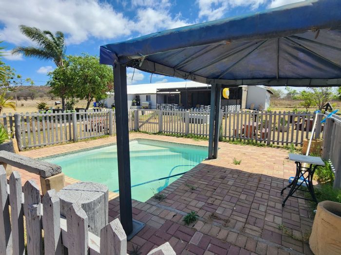 For Sale: 30-bedroom farm in Roodepoort AH with bar, restaurant, and abundant water.