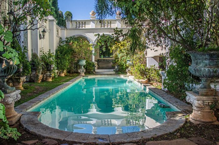 Illyria House in Muckleneuk: 8 en-suite bedrooms, gardens, pools, and spa. For Sale.