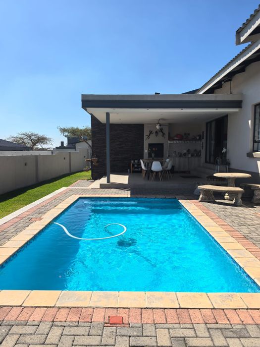 For Sale: 4-Bedroom House in Sonheuwel, eco-friendly estate with wildlife amenities.