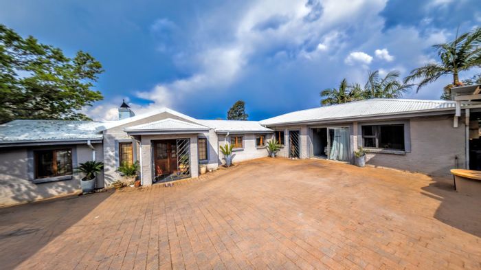 For Sale: Spacious Waterkloof Ridge house with 5 bedrooms, flatlet, and expansive garden.