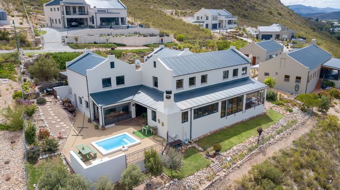 For Sale: House in Montagu Central with panoramic views, cottage, and solar power.