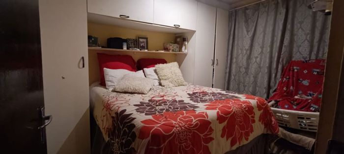 For Sale: 2-bedroom house in Rabie Ridge with income-generating outside rooms.