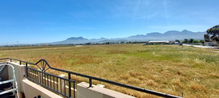 For Sale: 2-bedroom apartment in Whispering Pines with balcony, pool, and security.