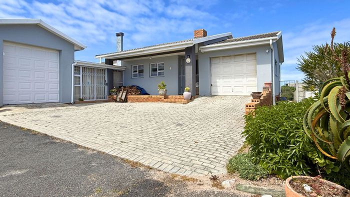 Kleinbaai House For Sale: Spacious with sea views, flatlet, and dual-living potential.