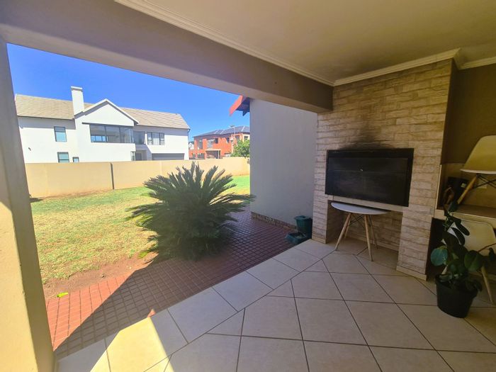 House For Sale in Raslouw Gardens: 3 beds, double garage, estate amenities.