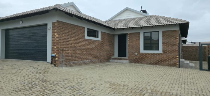 3-Bedroom Townhouse To Rent in Secunda Central with double garage and water backup.