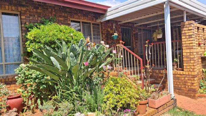 Townhouse For Sale in Pretoria North: 2 bedrooms, secure community, garden views.