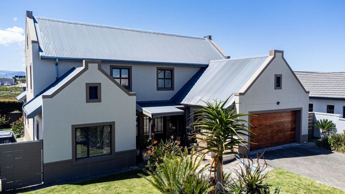 House For Sale in Blue Mountain Village: 4 beds, scenic views, secure living.