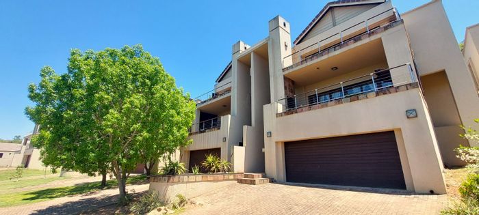 For Sale: Townhouse in Nelspruit Ext 11 with garden, double garage, and mountain views.