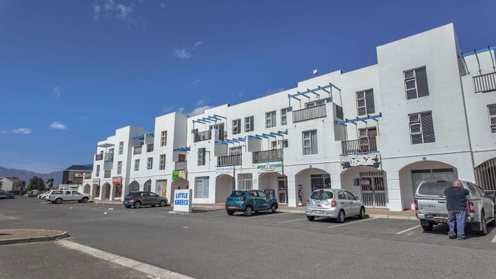 For Sale: Apartment in George Park with balcony, garage, and communal areas.