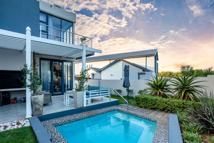 For Sale: House in The Hills Game Reserve Estate with pool, garage, and clubhouse.