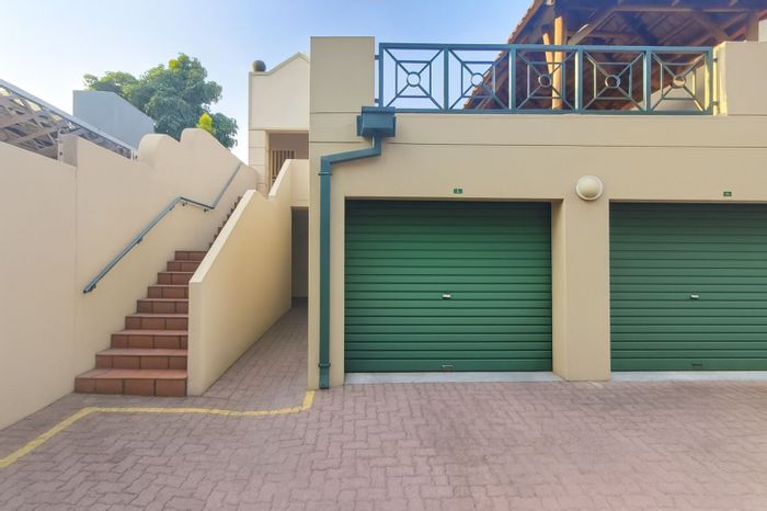 Ground-floor apartment for sale in New Redruth with private garden and garage.