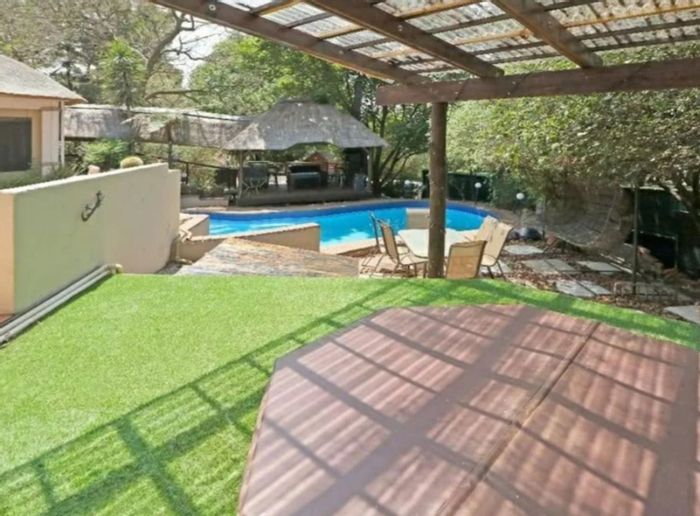 House To Rent in Roodekrans: Secure, furnished, garden views, pool, gym, parking.