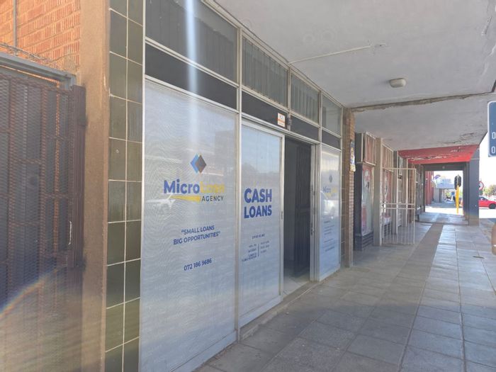 For Sale: Office in Kimberley Central with flats, open-plan space, and security features.