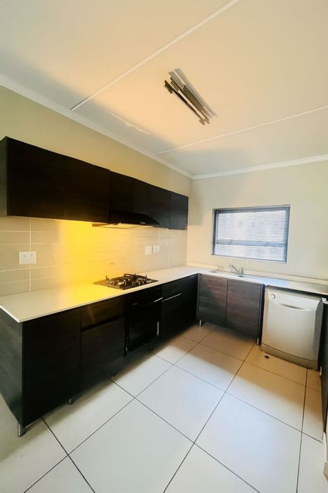 For Sale: 2-Bedroom Apartment in Fourways with Balcony, Parking, and Fibre Connectivity.