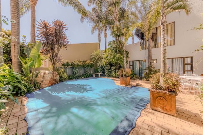 For Sale: House in Constantia Kloof with pool, garden entertainment room, and 4 garages.