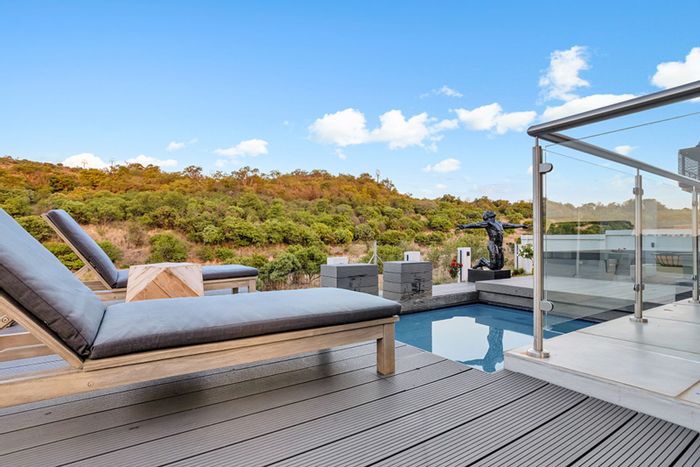 For Sale: House in The Hills Game Reserve Estate with pool, greenbelt views, and clubhouse.