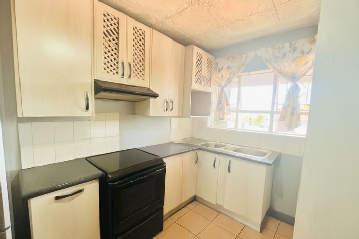 2-Bedroom Apartment For Sale in Florida with communal areas and secure parking.